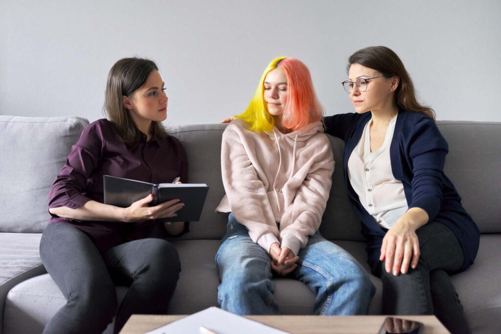 mother and daughter with probation officer